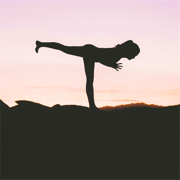 a woman doing balancing exercise
